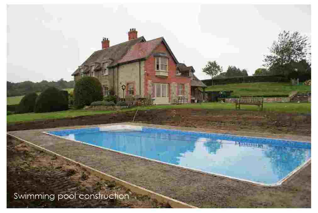 Swimming pool large country garden design Shaftesbury Wiltshire